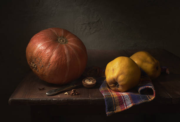 istock Still life with pumpkin and quince 1213130105