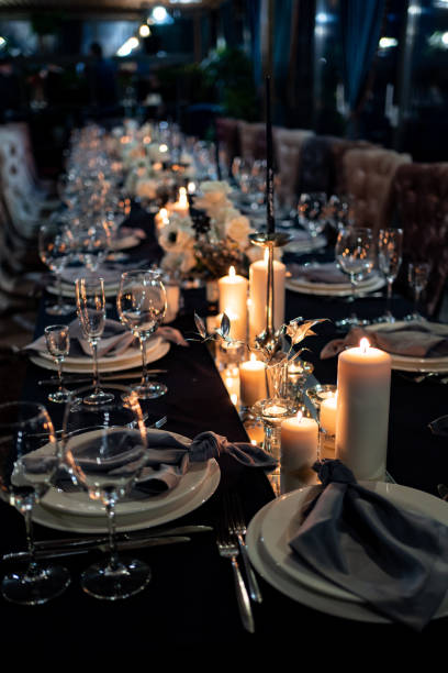 istock festive table setting candles for wedding party 1213133860