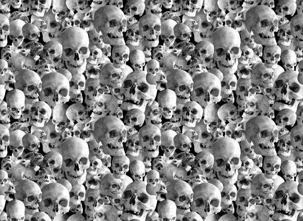 istock Seamless background of many human skulls. Illustration. 1213135269