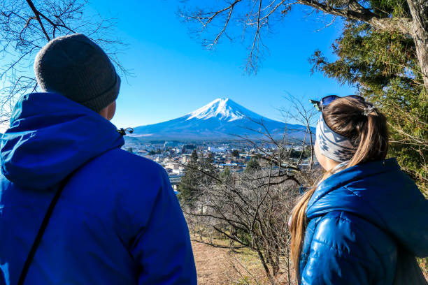 istock Japan - A couple admiring Mt Fuji 1213135508