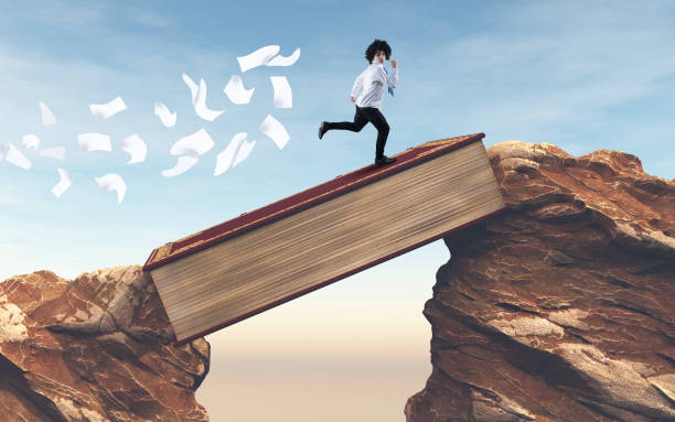 Student running over a gap between mountains on a book . Overcome any obstacle .