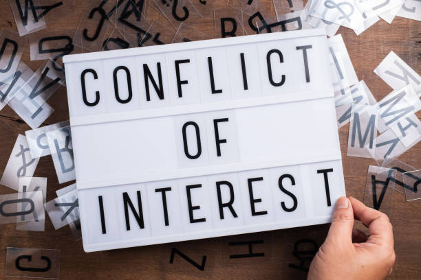 istock Conflict of Interest 1213137203