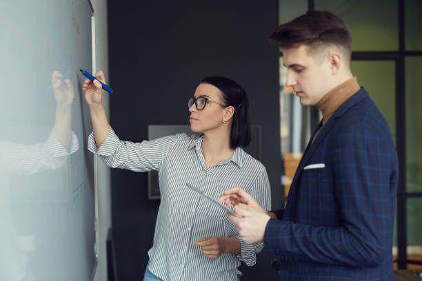 istock Business people making report in team 1213139034