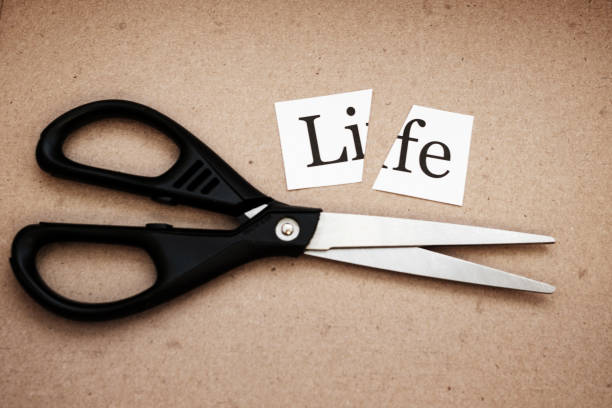istock on a strip of paper it is written: it is cut with scissors 1213145047
