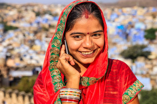 istock Young Indian woman using mobile phone, Jodhpur, India 1213148557