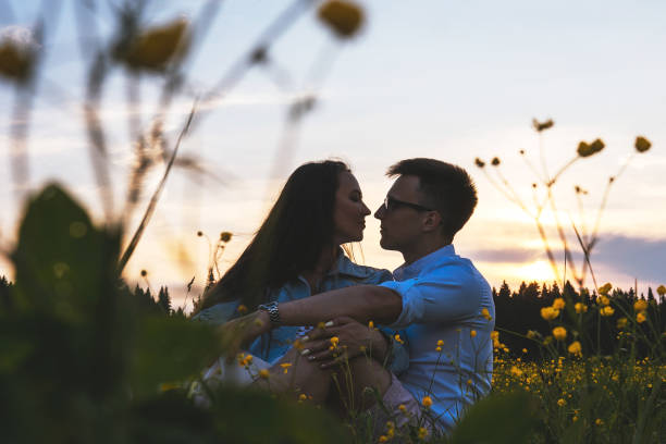istock Loving couple in the field. Sunset. 1213148642