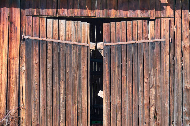 Wooden background. Weathered, ancient wooden door.