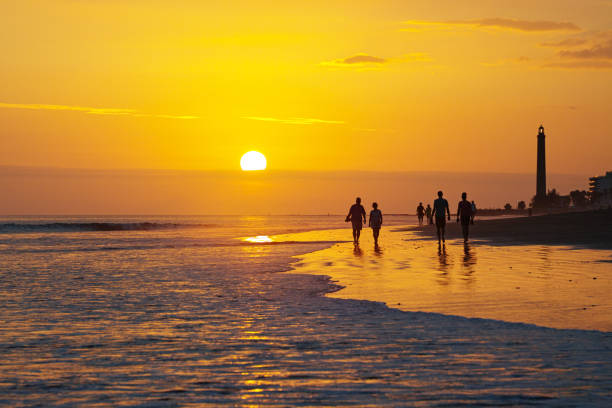 istock sunset on the beach, maspalomas gran Canaria spain 1213151154