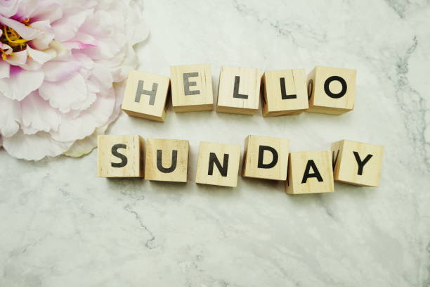 istock Hello Sunday word on light box with space copy on marble background 1213152498