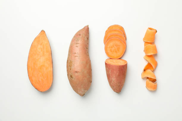 istock Flat lay with sweet potato on white background, top view 1213153993