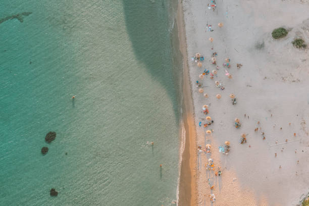 istock aegean beach from above with people 1213155453
