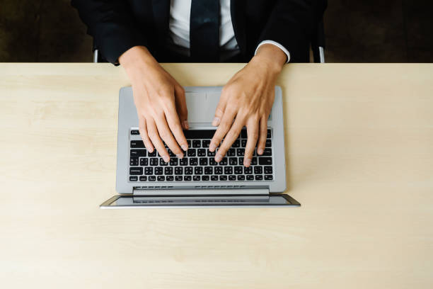 istock Business person worker uses a laptop computer. 1213159279
