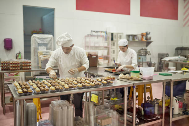 istock Professional Hispanic American Bakers in Commercial Kitchen 1213165118