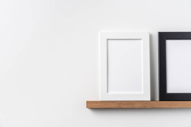 istock white and black wood photo on bookshelf 1213165402