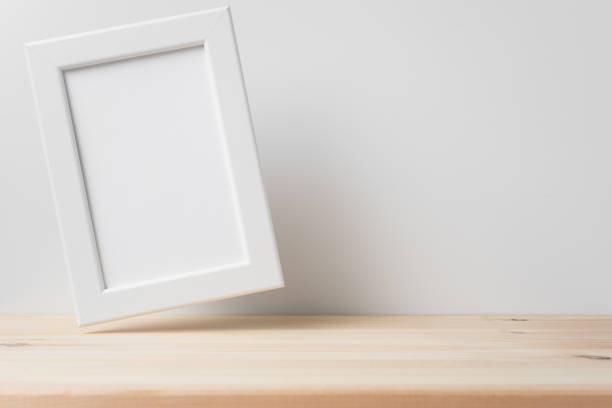 istock vertical white wood photo on floor with white wall 1213166522