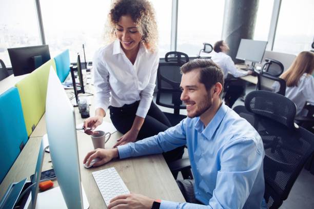 istock Corporate team working colleagues working in modern office. 1213166886