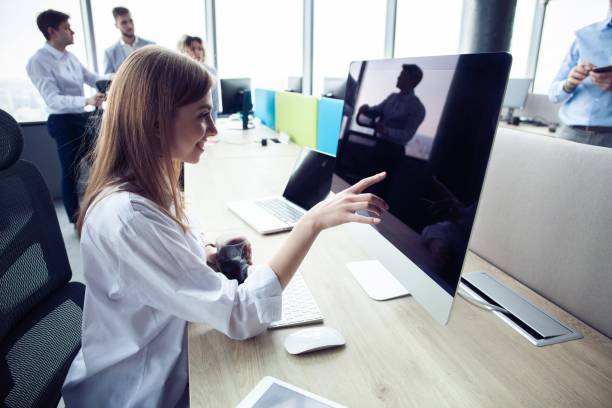 istock Young business woman with computer in the office. 1213166904