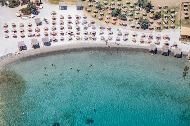 istock aegean beach from above with people 1213167424