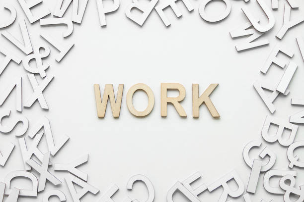 istock Word work wooden alphabet concept on white background. 1213167448