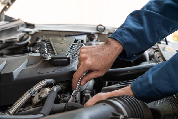 istock Professional mechanic providing car repair service 1213171694