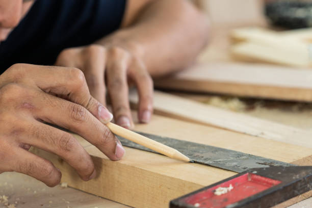 istock Carpenter working on wood craft at workshop 1213171915