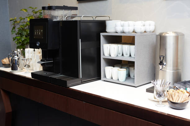 istock Coffee, cups on catering table at conference or wedding banquet. Group of empty white ceramic cups for coffee or tea in outside buffet at the business meeting event or hotel. 1213172434