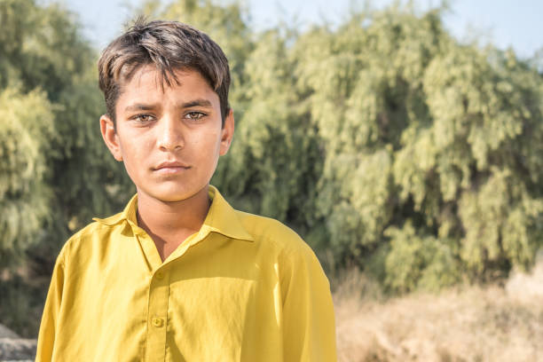istock a lonely refugee child and sad expressions on his face 1213174684