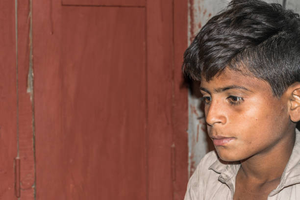 istock a lonely refugee child and sad expressions on his face 1213176546