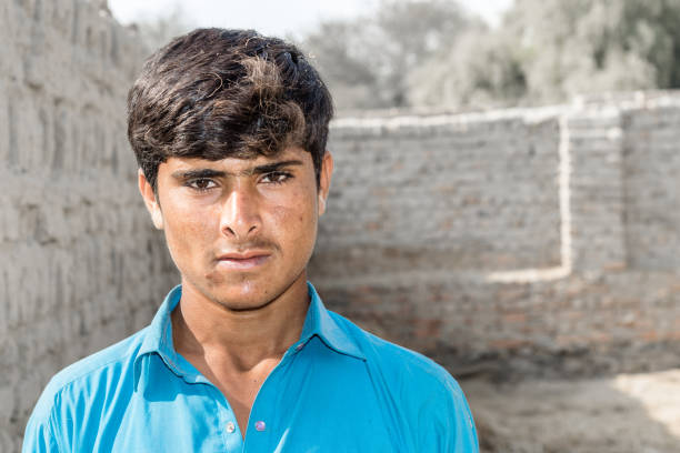 istock a young farmer is standing under hot sunny day 1213176786