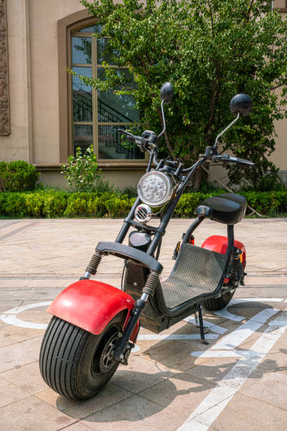 istock Electric motorcycle parked on the sidewalk 1213182601