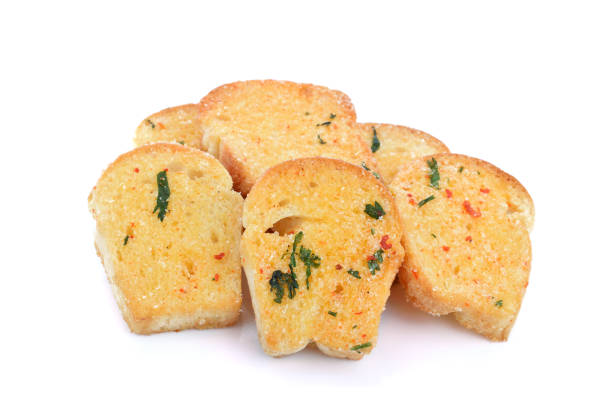 Homemade garlic bread on white background