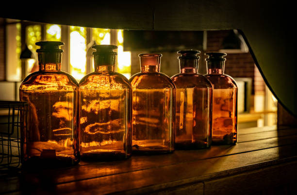 istock Neatly arranged glass bottles.Glass bottle texture 1213184976