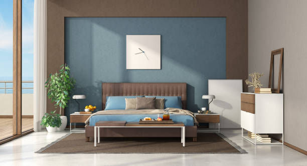 istock Blue and brown modern master bedroom 1213186112