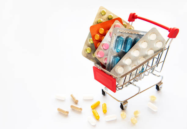 istock Shopping cart filled with pills 1213187096