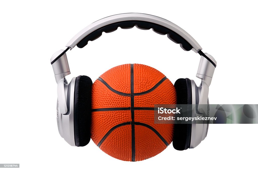 Headphones on a basketball ball, sport and music concept  Basketball - Ball Stock Photo