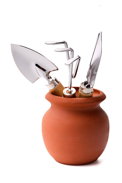istock Set of gardener or florist tools in a pot 121318747
