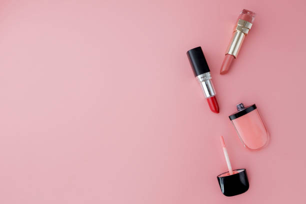 istock Makeup products on pink background. Top view with copy space 1213188256