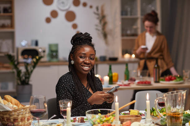 istock African woman using her mobile phone 1213192837