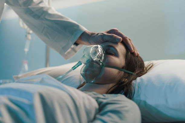 istock Hospitalized patient lying in a bed 1213198674