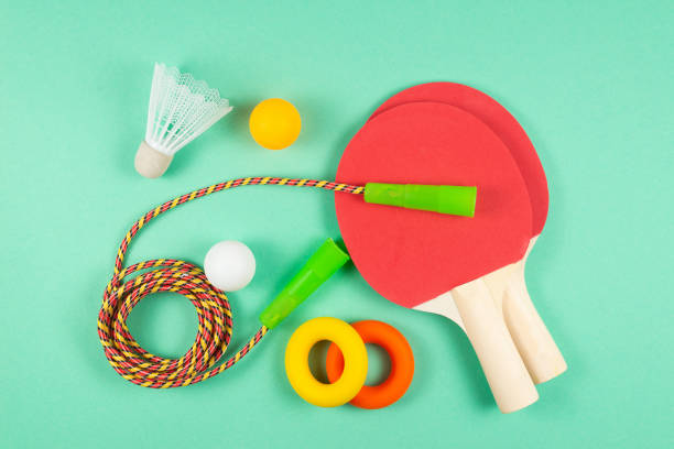 istock Sport equipment on green background. 1213202047