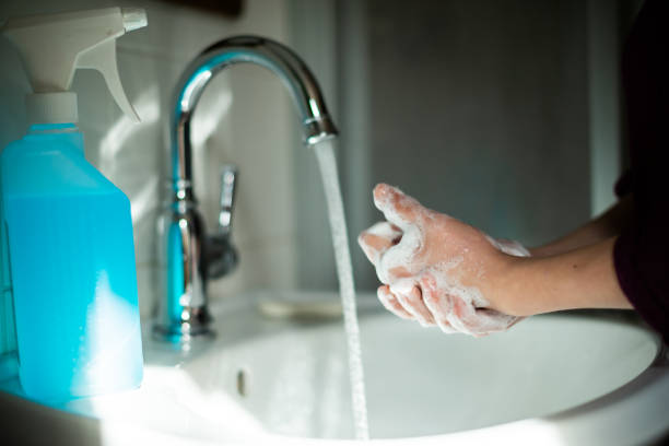 istock Hands washing in the bathroom at home 1213207226