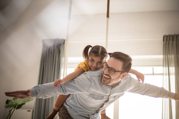 istock Dad is here to give you his wings. 1213208232