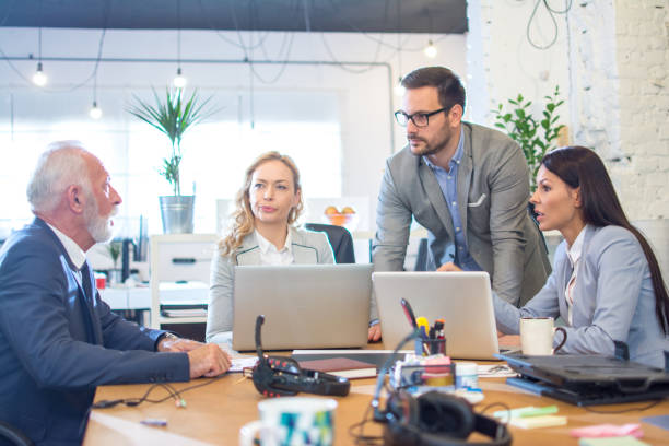 istock Business partners on conference table planning business strategy at office 1213208287