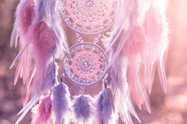 istock Handmade dream catcher with feathers threads and beads rope hanging 1213220437