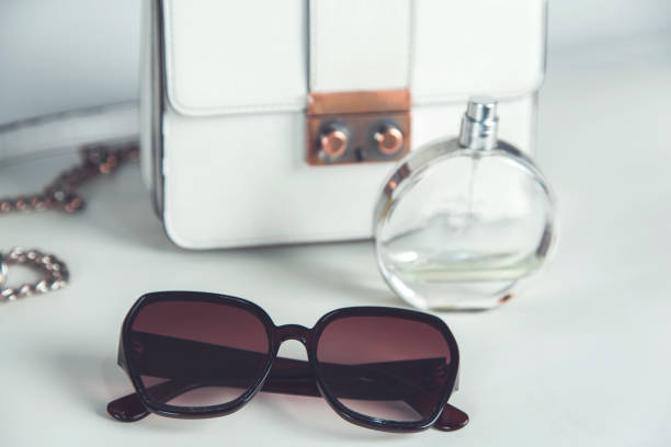 istock bag with perfume and galsses 1213224262
