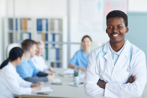istock Young African Doctor Smiling at Camera 1213228157
