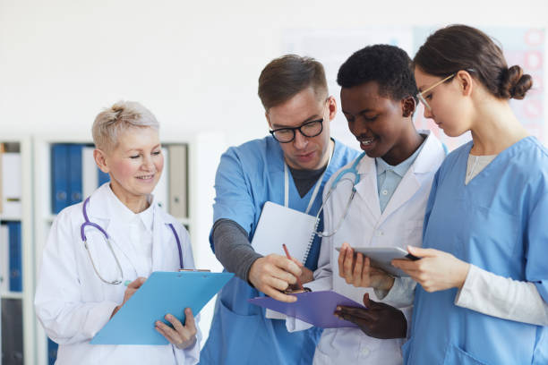 istock Group of Doctors in Clinic 1213228243