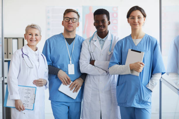 istock Multi-Ethnic Group of Doctors Posing in Clinic 1213228253