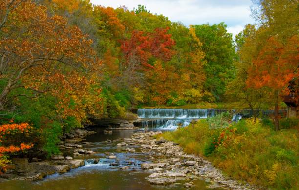 istock Waterfall Pipe Creek Falls-Cass County Indiana-Fall Colors 1213229521