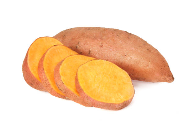 istock Sweet potatoes with slices isolated on a white background 1213232358